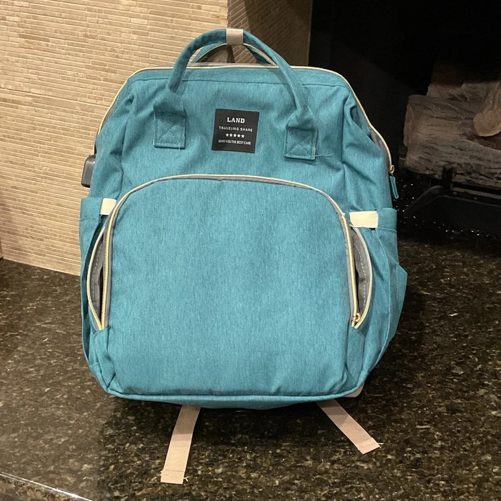 Land Traveling Share Backpack Teal